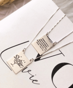 escapulario arvore da vida em prata 925 em livro branco